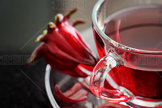 Closeup view of cup of hibiscus tea (rosella, karkade)