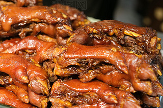 close up stack of pot-stewed pig's trotters. traditional Chinese food