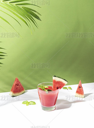 Fresh water melon juice and watermelon slice on color background