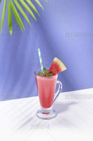 Fresh water melon juice and watermelon slice on color background