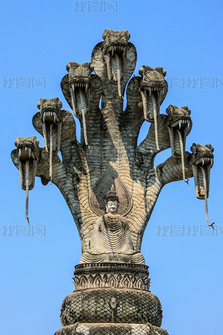  Big Image of the Buddha sitting under the canopy of serpent's heads in Sala Kaeo Ku or Wat Khaek at
