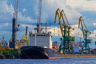 Seaport. Port cranes. Loading equipment in the port. Unloading c