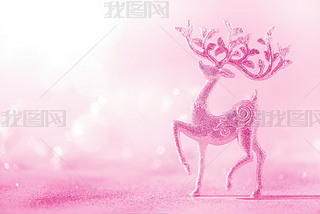 Silver glitter Christmas deer on neon pink background with lights bokeh, copy space. Greeting card f