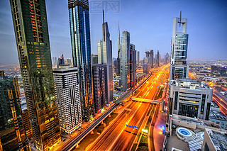 Dubai sunset panoramic view of Burj Khalifa with Sheike Zayed road. Dubai is super modern city of UA