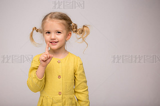 cute little girl in yellow dress