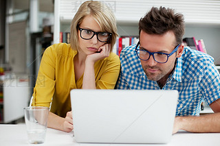 Two students learning in library