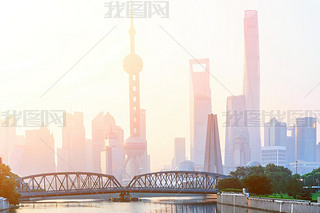 landmarks and a bridge of shanghai on the shore