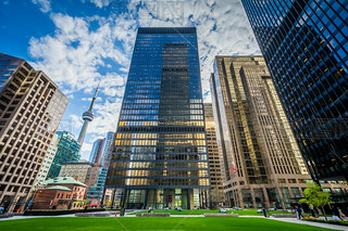 Park and modern buildings in downtown Toronto, Ontario.