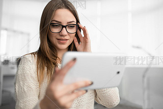 Young woman using tablet pc