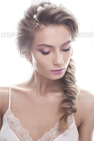 Beautiful girl in image of bride with wreath of flowers on her hair. Beauty face