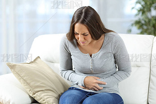 Woman suffering stomach ache