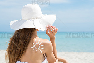 Sun Drawn With Suntan Lotion Woman's Shoulder