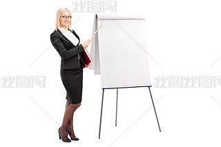 Businesswoman pointing on presentation board