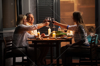 Quiet family dinner in the backyard