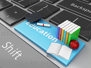 3d graduation cap, books on computer keyboard.