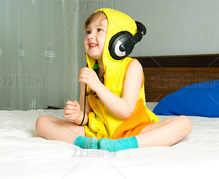 Little girl listening to the music