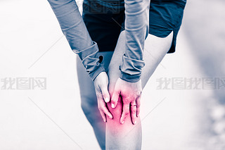 Knee pain, woman holding sore and painful leg