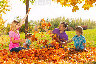 Playful kids and parents throw lees