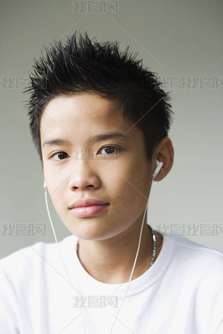 Portrait of a boy listening to headphones