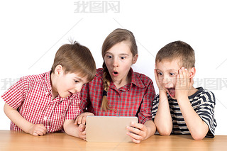 Group of Children Playing Exciting Game on Tablet Isolated on White