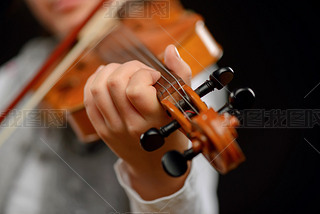 Nice girl playing the violin