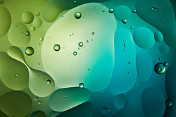 绿色和蓝色混合水泡和油泡的抽象背景