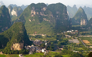 Guilin village at sunset from Moon Hill mountain. Yangshuo, China, Asia