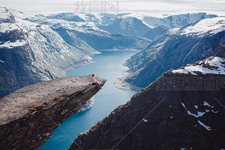 girl   on a rock , Norway fjords