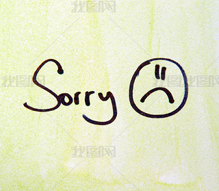 sorry note with pen