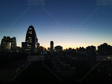 北京CBD高楼城市剪影晚霞摄影图背景图