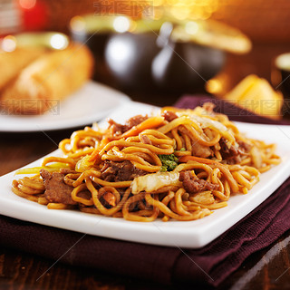 Chinese beef lo mein on plate