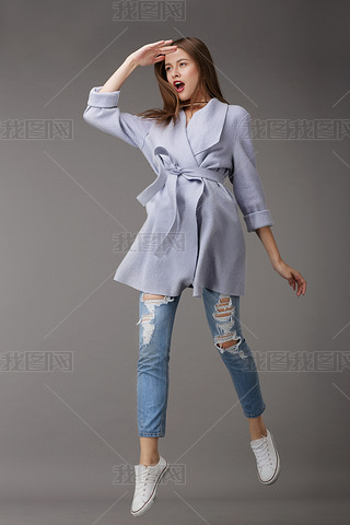 Emotional Young Woman in Outer Garments
