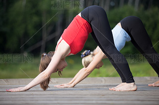 Yoga class: Downward facing dog pose