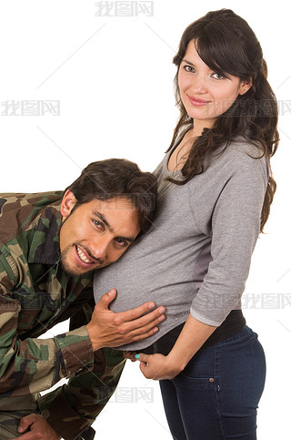 happy proud military soldier hugging pregnant wife