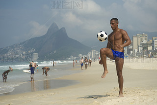 Young Brazilian Man Playing Altinho Beach Football