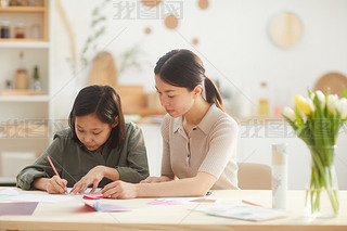 Girls Creating Something For Mother