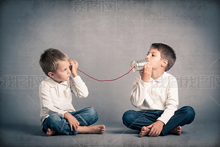 brothers talking with tin can telephone