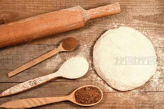 homemade baking. Fresh dough for pastry, kitchen rolling pin, spoon flour on a chopping Board