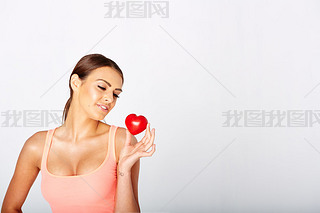 Heart shape in womans hands.