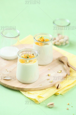 Pistachio Panna Cotta with Honey Orange Sauce