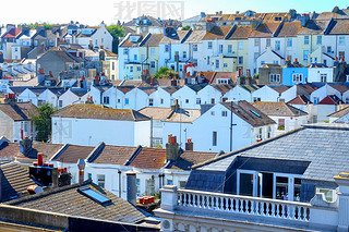rows of English terraced houses close together on top of each ot