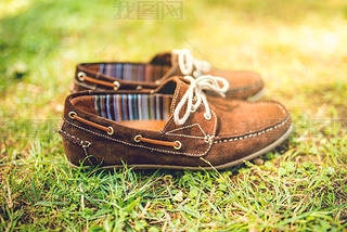 mens brown leather shoes, suede leather. mens fashion concept, brown mocassins ready for catalog and